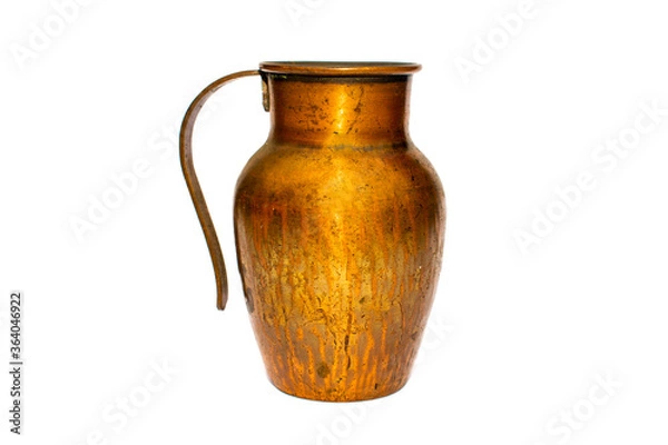 Fototapeta Small gold shiny old copper / bronze  jug / pot with handle on a white studio background