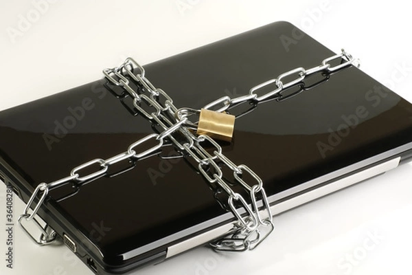 Fototapeta lap top in chains