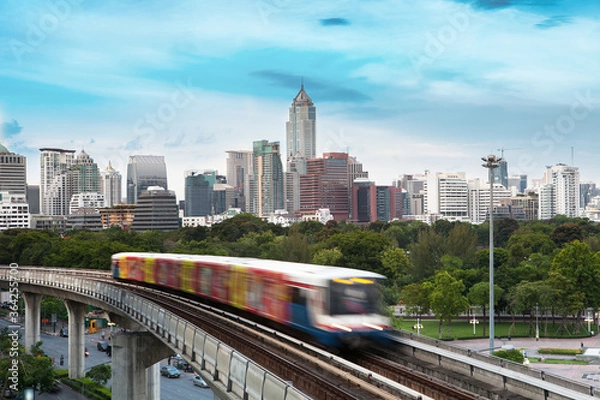 Fototapeta Sky train, The rush hour of bangkok business district at working day.