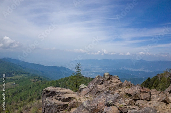 Obraz View of Kofu basin and cloud ( cirrostratus and cumulus) in a early summer at near Mt.Daibosatsu, Yamanashi Prefecture, Japan.