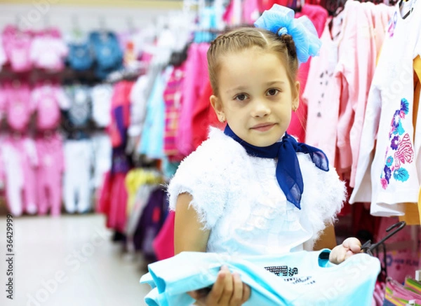 Fototapeta Young woman doing shopping