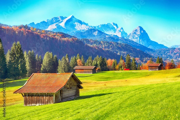 Fototapeta Splendid view of alpine meadow near Wagenbruchsee (Geroldsee) lake with wooden huts