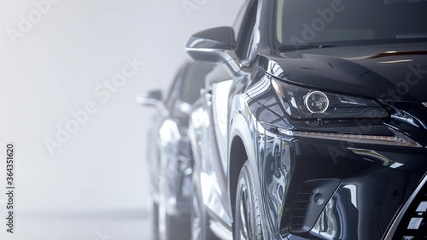 Obraz black car modern xenon lamp headlight. Close-up detail on one of the led headlights