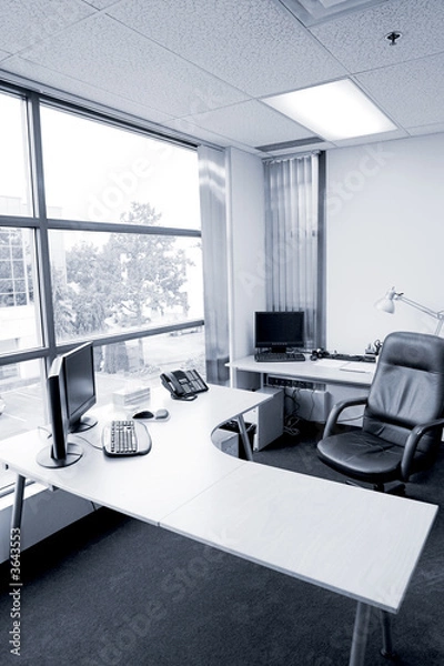 Obraz wide angle of office desk in blue tone