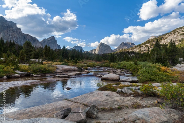 Fototapeta The East Fork River in the Wind River Range of Wyoming. Left to right, Ambush Peak, Raid Peak and Midsummer Dome are seen to the north.