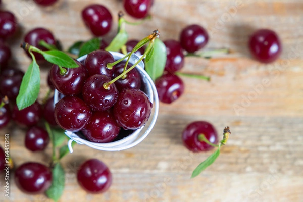 Obraz cherries on a wooden table