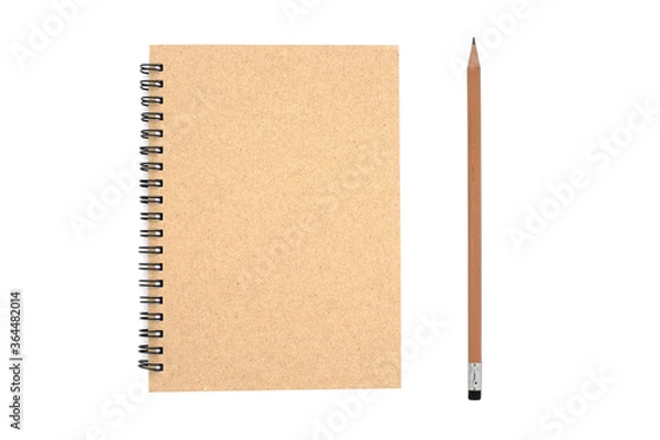 Fototapeta Top view above of brown spiral notebook and pencil isolated on white background for design a mockup. Education and business concept. flat lay  with clipping path.