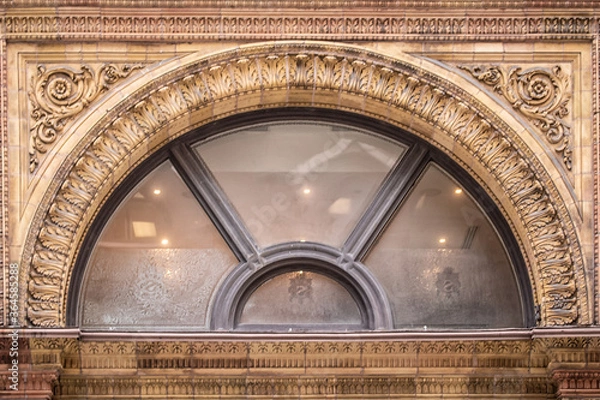 Obraz Arch Shaped Window of a Commericial Building