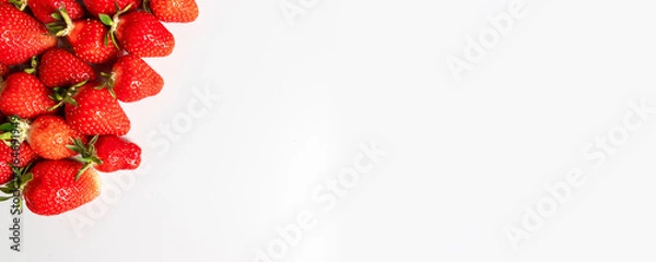 Fototapeta Top view background with organic and tasty strawberry berries frame on white background