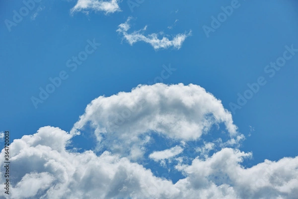 Fototapeta cumulus clouds on a summer day