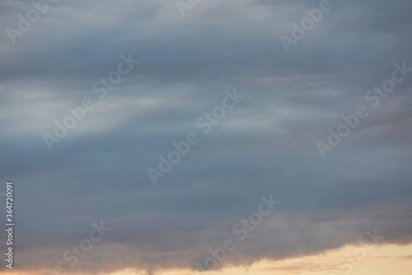 Fototapeta Cloudy sunset on a summer evening