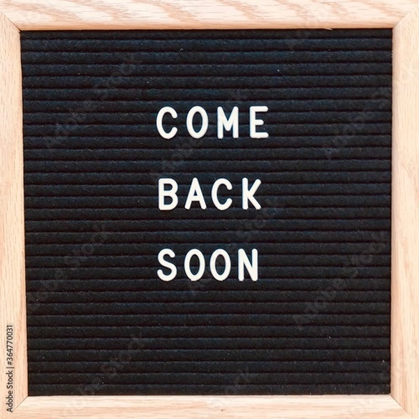 Fototapeta word board letters note inspirational quote morning message words to live by on sign personal note hopeful come back soon 