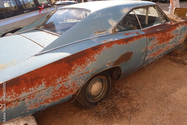 Fototapeta rustic american vintage car in garage spot
