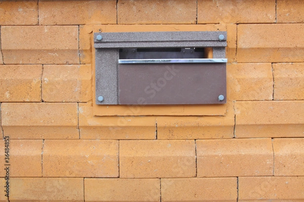 Fototapeta mail box on the wall of fence