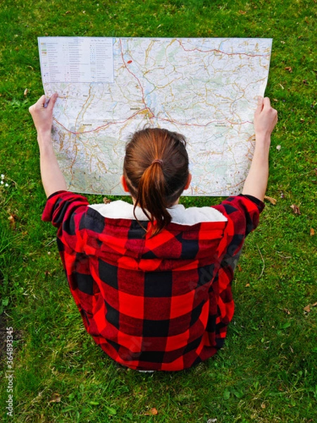Obraz girl reading a maps