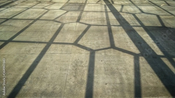 Fototapeta angular shaped shadows on the concrete
