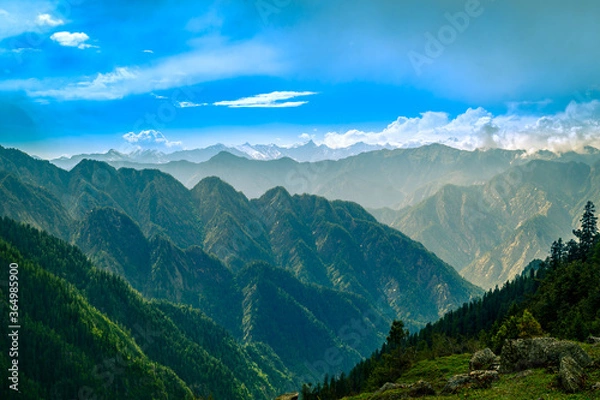 Obraz Mountain landscape with clouds, meadows. Himalayas peaks & alpine l from the trail of Sar Pass trek  Himalayan region of Kasol, Himachal Pradesh, India.