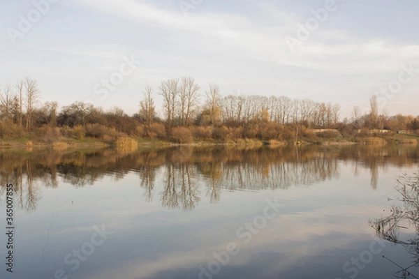Obraz the bank of autumn lake water reflection smooth water