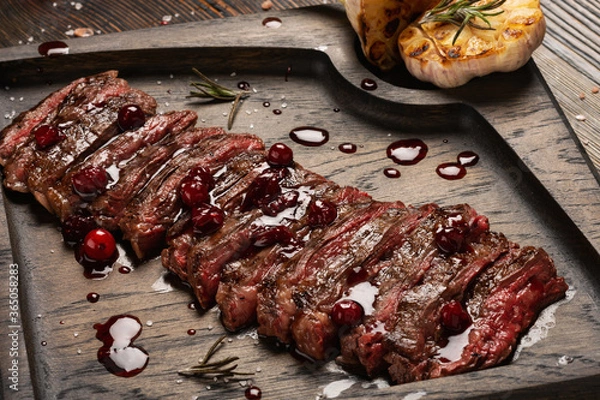 Obraz Medium Rare Skirt steak on wooden board