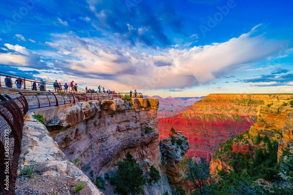 Fototapeta Panoramic image of the colorful Sunset on the Grand Canyon in Grand Canyon National Park from the south rim part,Arizona,USA, on a sunny cloudy day with blue or gloden sky
