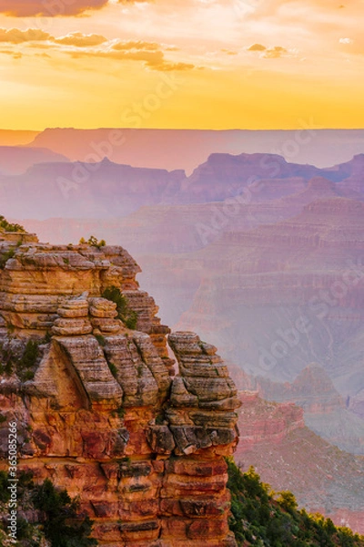 Fototapeta Panoramic image of the colorful Sunset on the Grand Canyon in Grand Canyon National Park from the south rim part,Arizona,USA, on a sunny cloudy day with blue or gloden sky