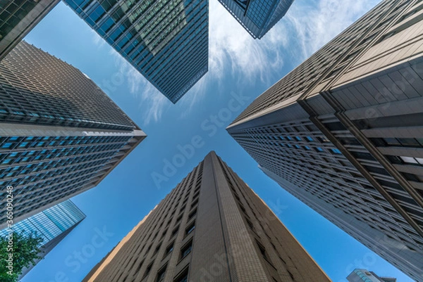 Obraz Tokyo Cityscape. Low angle view of skyscraper buildings scenery. Marunouchi district (丸ノ内), Tokyo, Japan