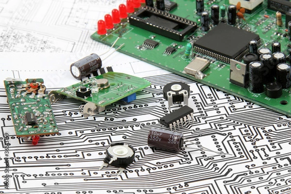 Fototapeta Electronic circuit boards on the background of electronic scheme