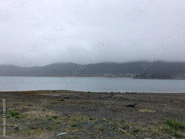 Fototapeta storm clouds over the river