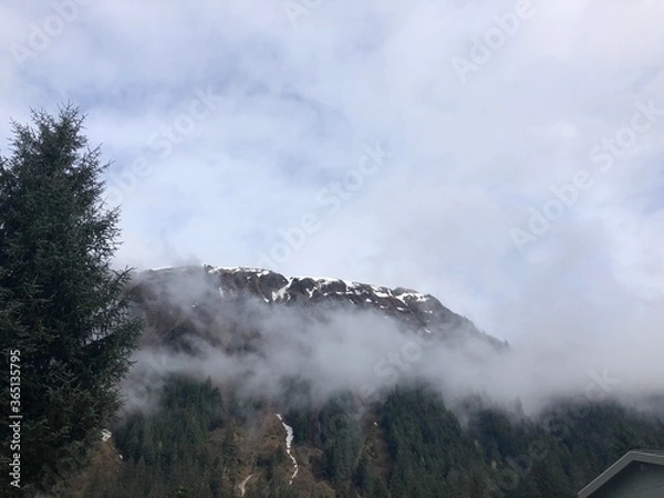 Obraz storm clouds over the mountain