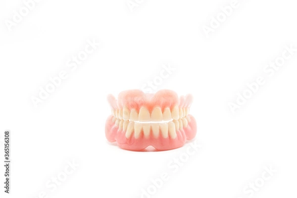 Obraz Dentures isolated on a white background. Denture, close up.