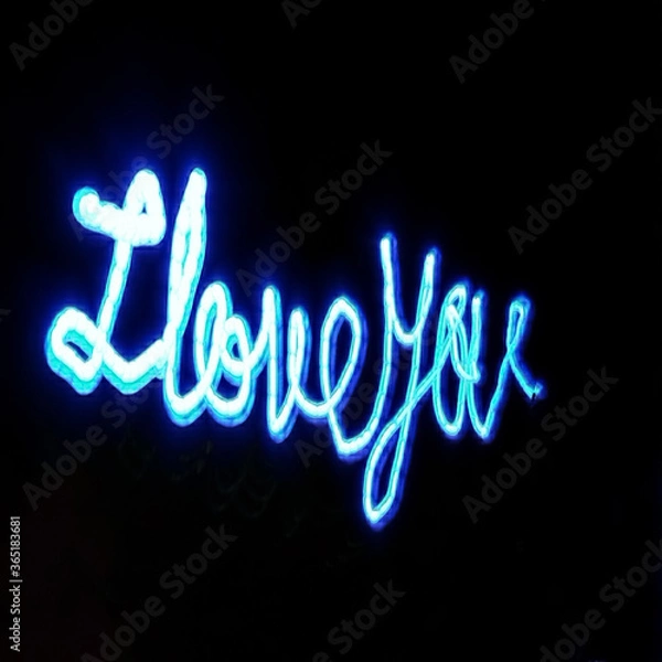 Obraz Light painting 3d design. Combination of sky blue and white light against a black background 