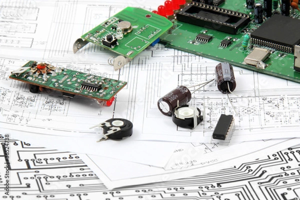 Fototapeta Electronic circuit boards on the background of electronic scheme