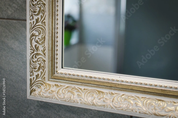 Obraz gold frame on the wall