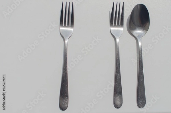 Obraz fork and spoon on white background