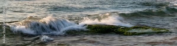 Obraz water splash on rocks