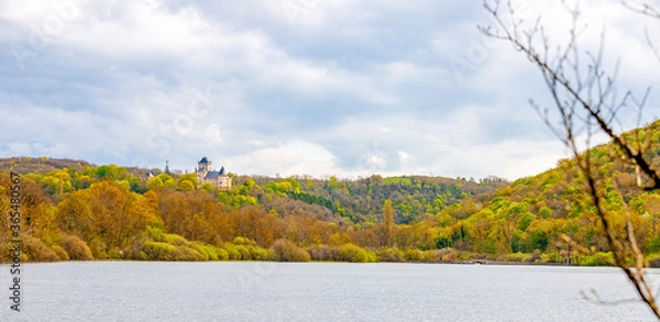 Obraz autumn landscape in the forest with a huge castle on a lake