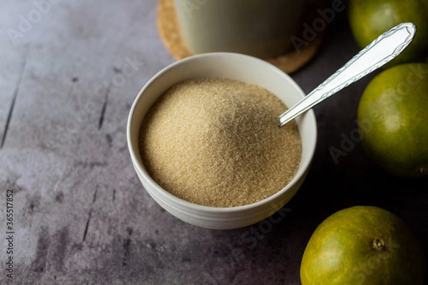 Obraz dried monk fruit, luo han guo, and monk fruit sugar crystals accompanied with a cup of tea or coffee