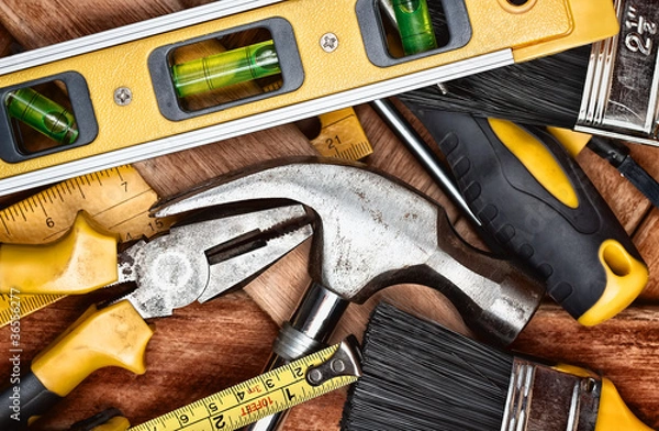 Fototapeta Set of manual tools over wooden boards