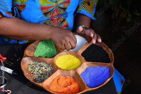 Fototapeta Container filled with multiple necklace beads