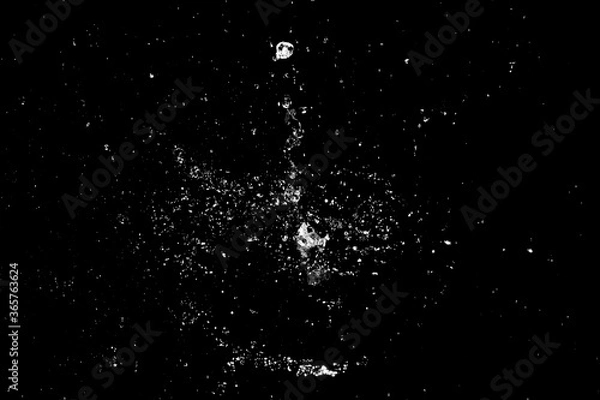 Obraz Splash of water in the dark for use in advertising images with screen mode.