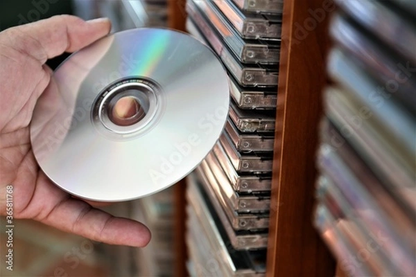 Fototapeta cd in hand