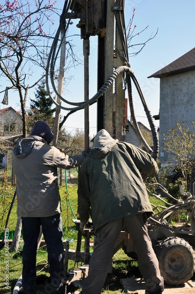 Fototapeta A homemade drilling rig for extracting water at shallow depths.