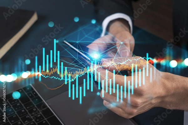 Fototapeta Multiexposure of man typing phone and financial chart. Success concept. Formal wear.