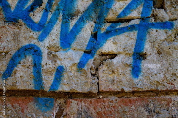 Obraz Drawings on a brick wall