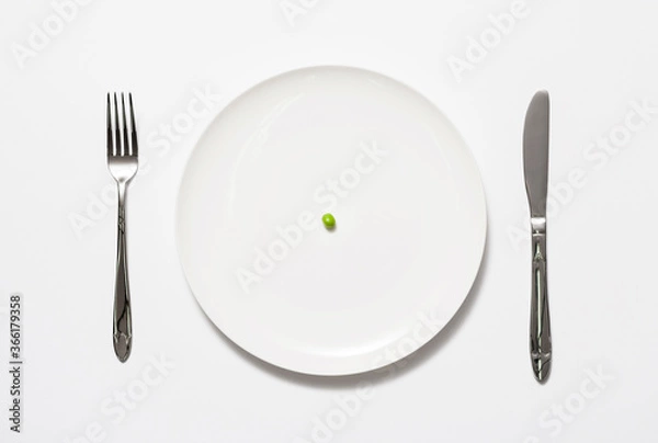Obraz A single pea on a plate
