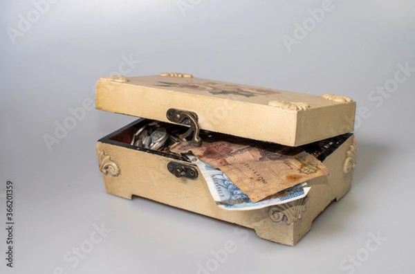 Obraz small carved box with old coins