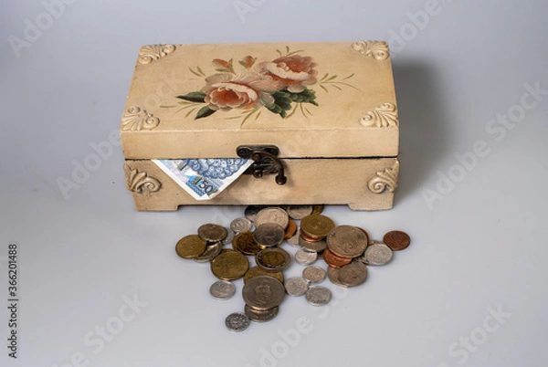 Obraz small carved box with old coins