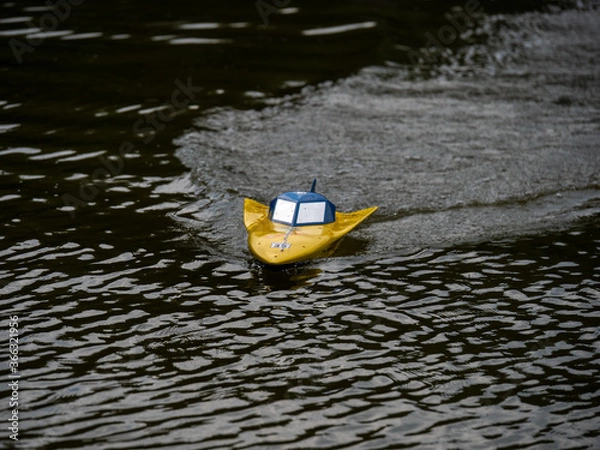Obraz RC controlled jet boat model on lake. Active summer vacation for school child.