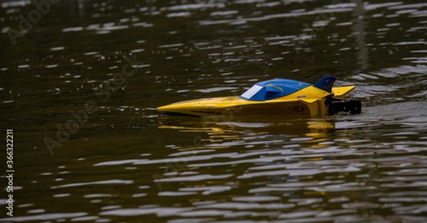 Obraz RC controlled jet boat model on lake. Active summer vacation for school child.