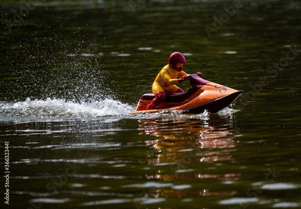 Obraz RC controlled jet ski model on lake.